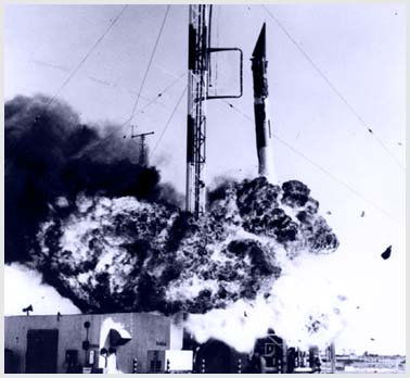 Old photo of an early rocket exploding on the pad.