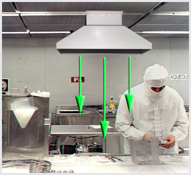 Photo of a worker beneath an overhead filter.